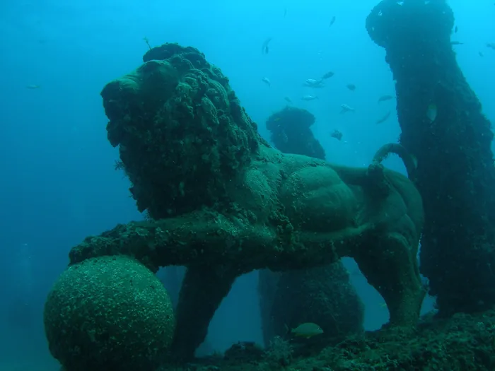 Underwater lion sculpture at Neptune Memorial Reef